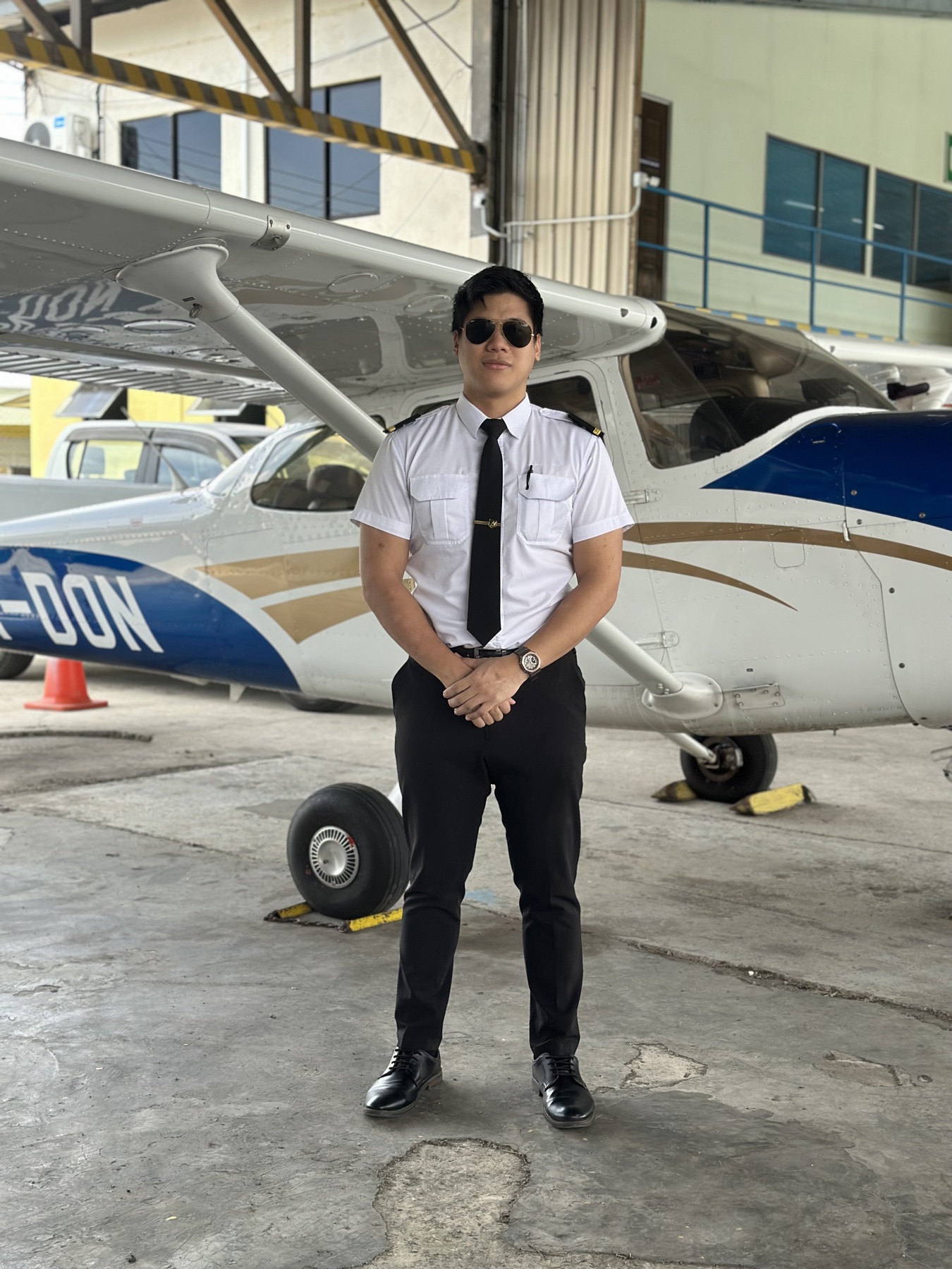 LLFA student beside a Cessna 172 training aircraft