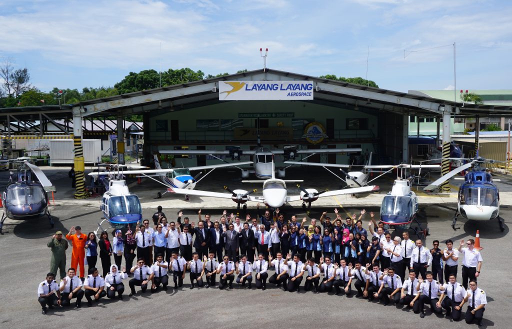 Layang Layang Flying Academy staff and cadets with the training fleet