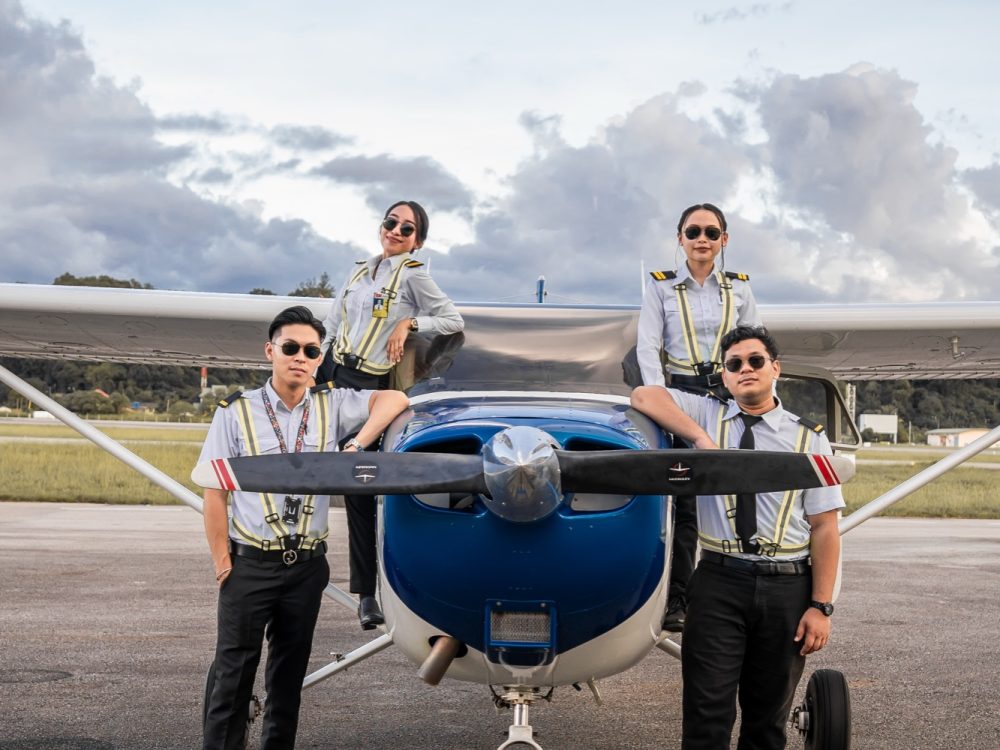 LLFA cadets standing with a training aeroplane on the flight line