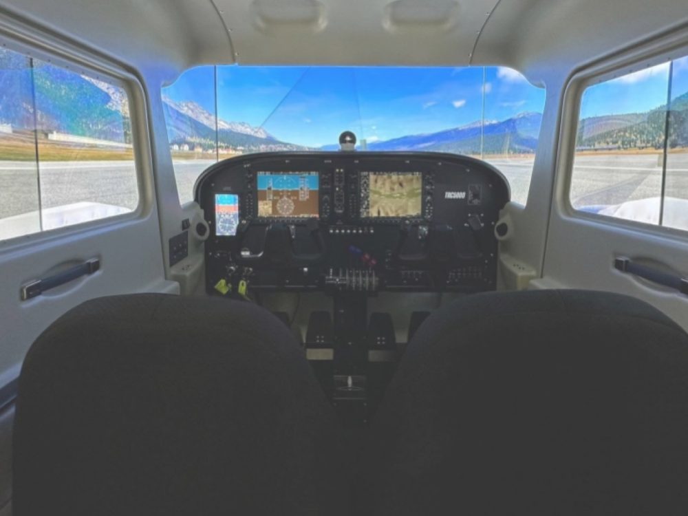 FNPT II flight simulator cockpit with visual displays at the LLFA Ipoh campus