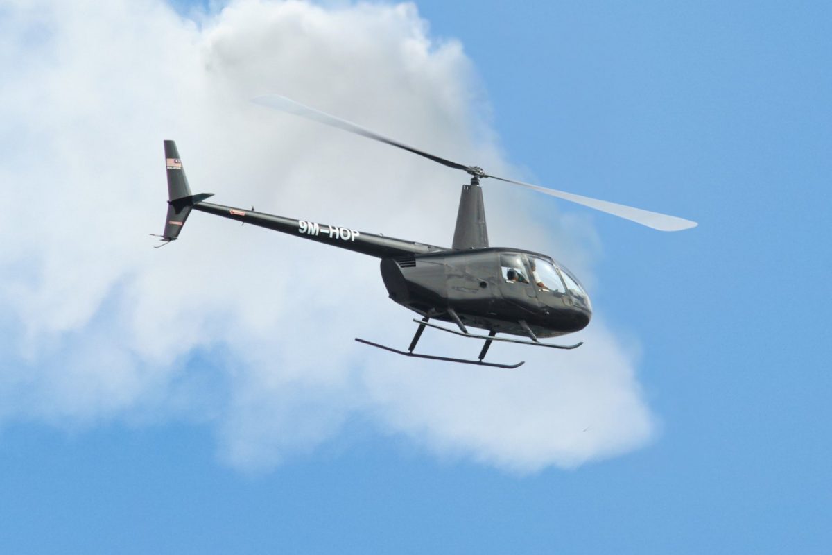 LLFA Robinson R44 helicopter in flight